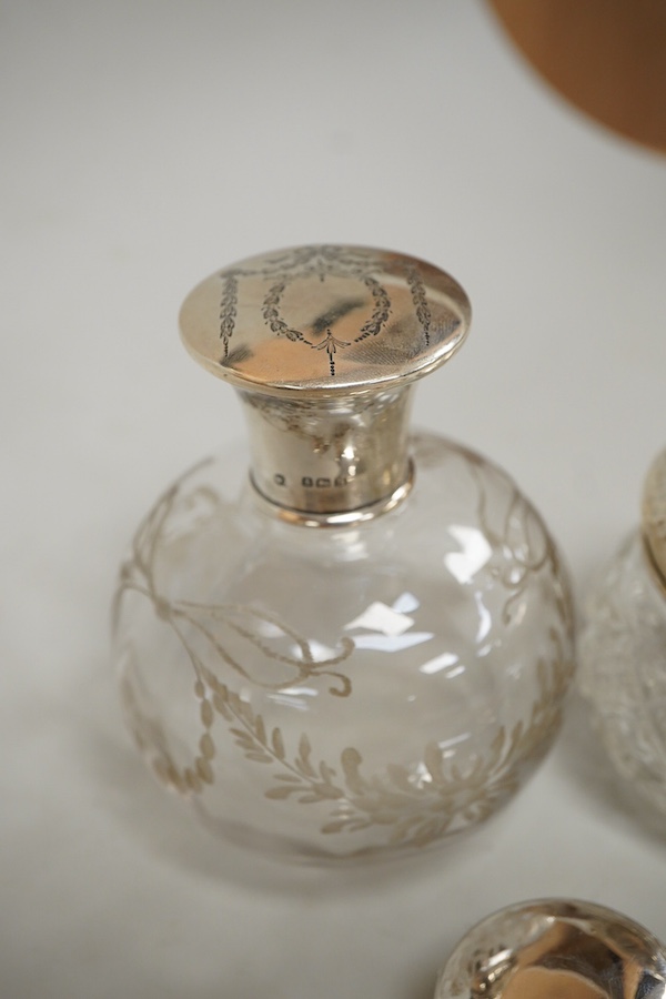 A George V silver topped engraved glass spherical scent bottle and other silver first height 11cm., weight approx. 3.46ozt